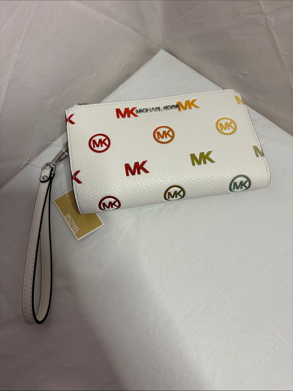 Michael Kors White Pebbled Leather Wristlet with Rainbow MK Logos
